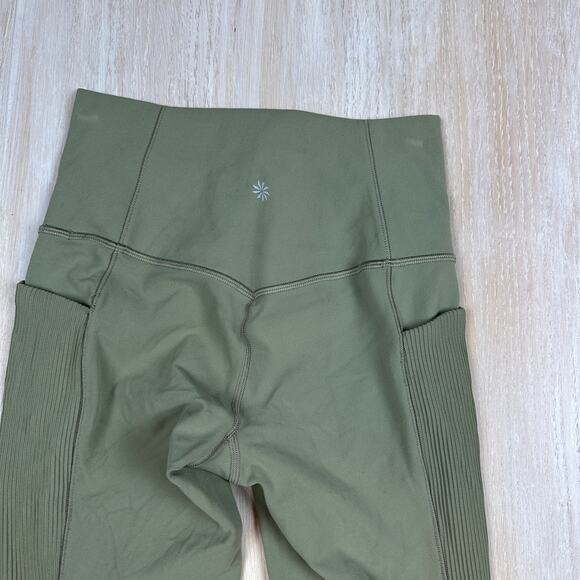 Athleta Salutation Stash Pocket II Laser Cut 7/8 Tight Olive Green Leggings XS - Picture 14 of 16